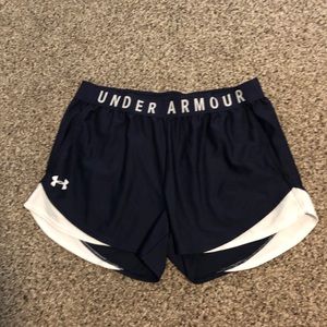 Navy blue and white athletic shorts